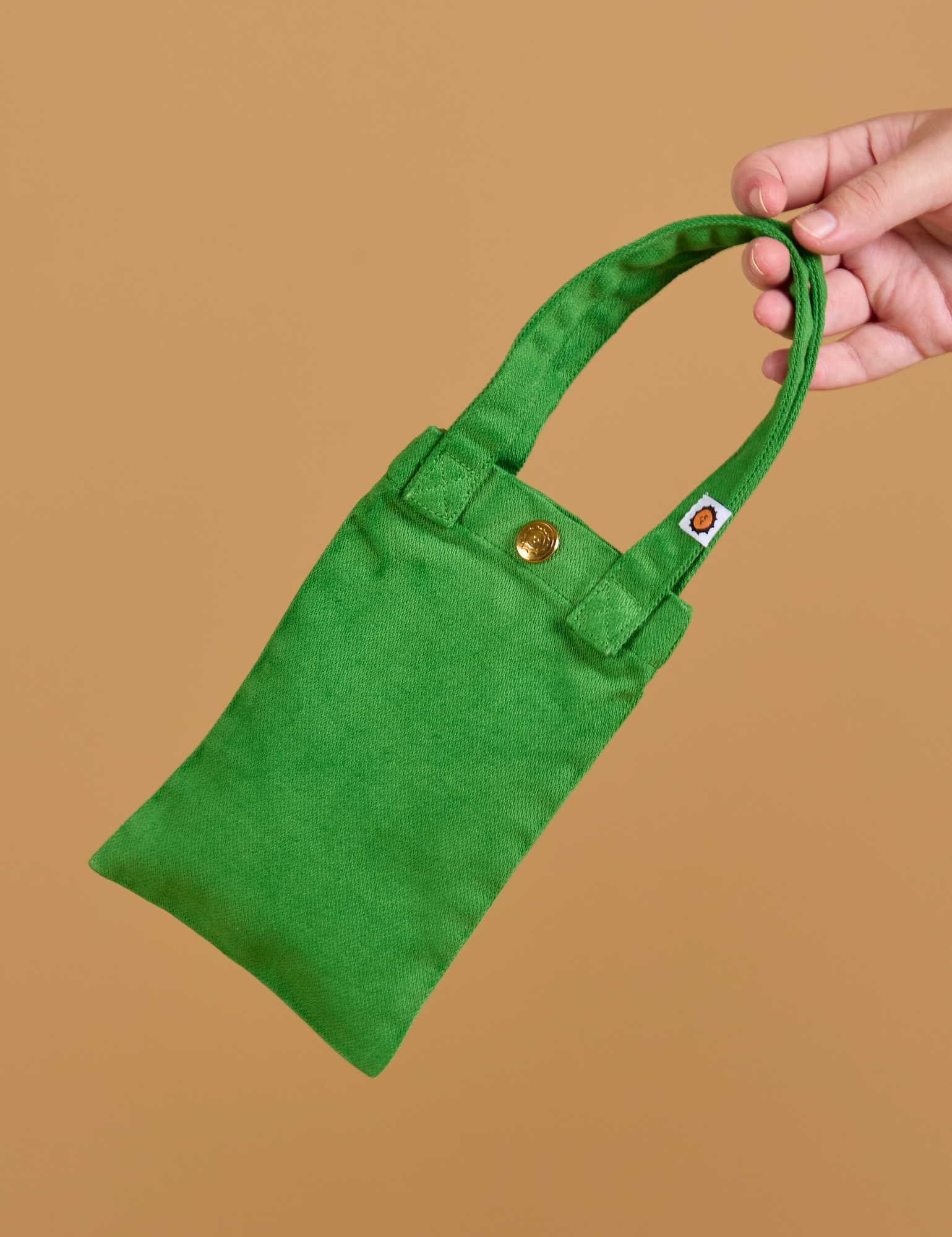 Cell Phone Tote in Kelly Green held by model