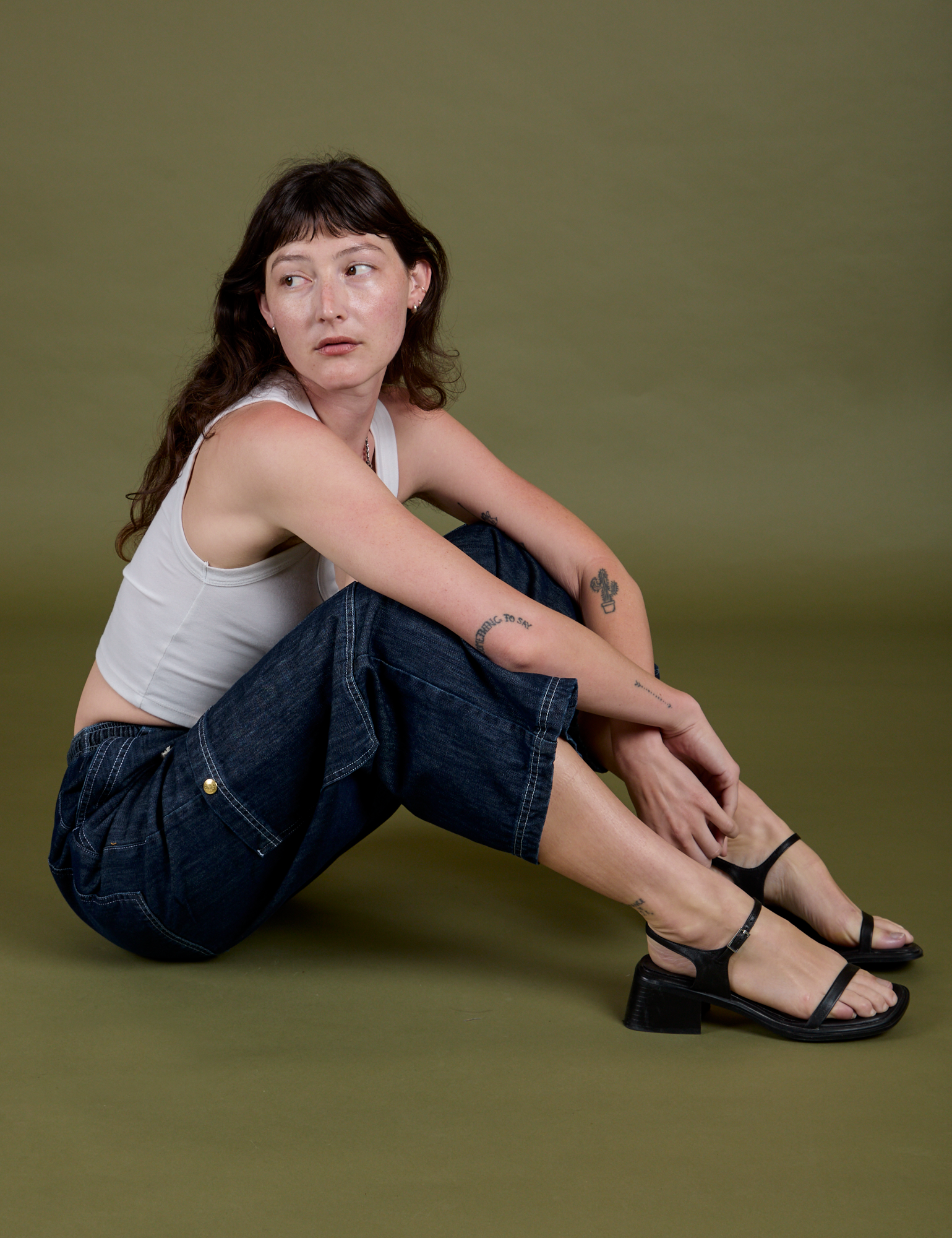Denim Drop Pocket Pants in Dark Wash and Cropped Tank in Vintage Tee White on Alex