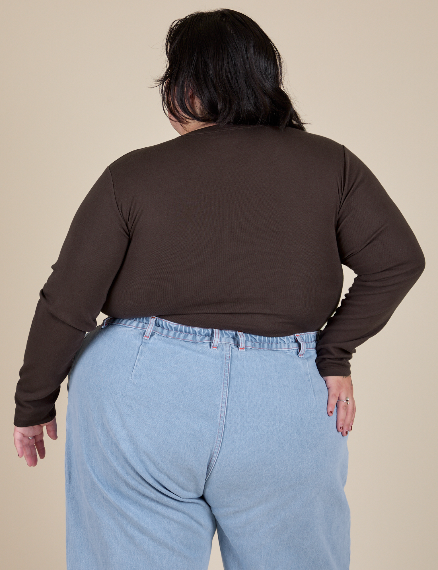 Long Sleeve Baby Tee in Espresso Brown back view on Sam