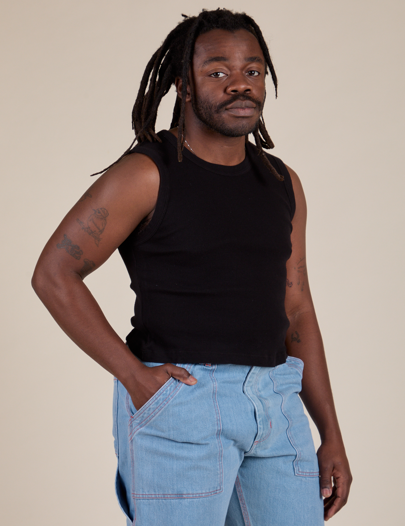 Angled front view of Muscle Tee in Basic Black on Demi