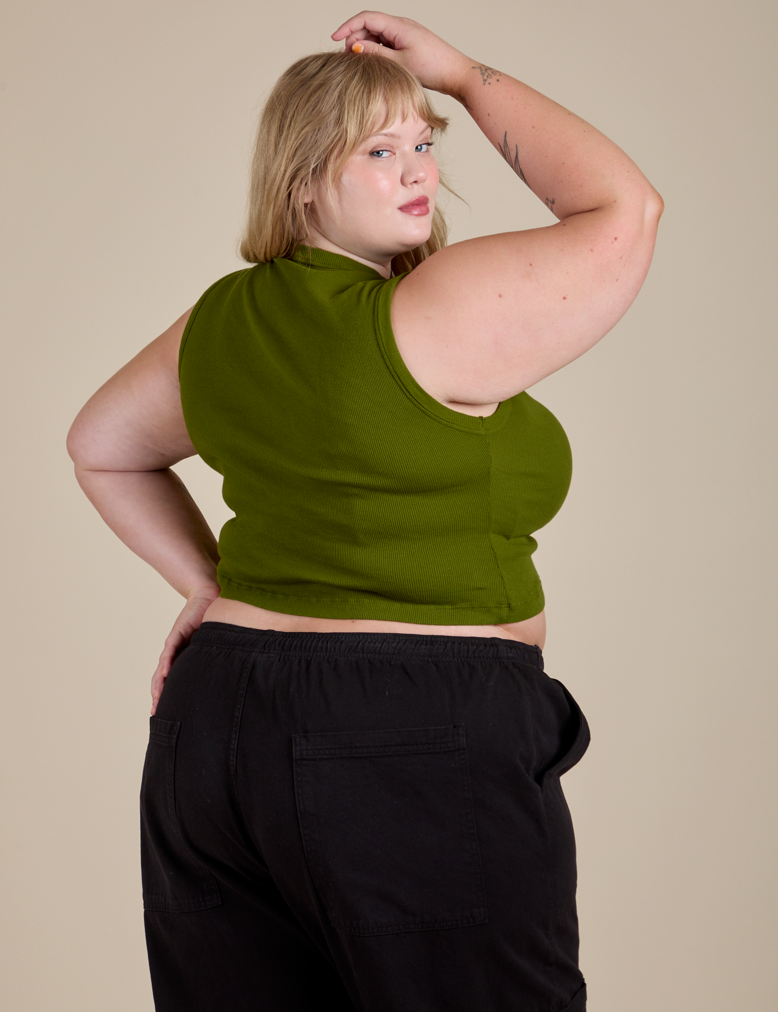 Angled front view of Muscle Tee in Summer Olive on Juliet