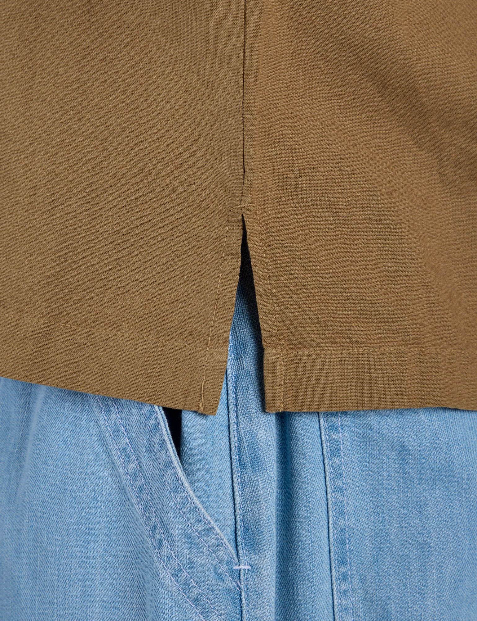 Close up of Pantry Button-Up in Desert Brown side vent on Isaac