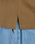 Close up of Pantry Button-Up in Desert Brown side vent on Isaac