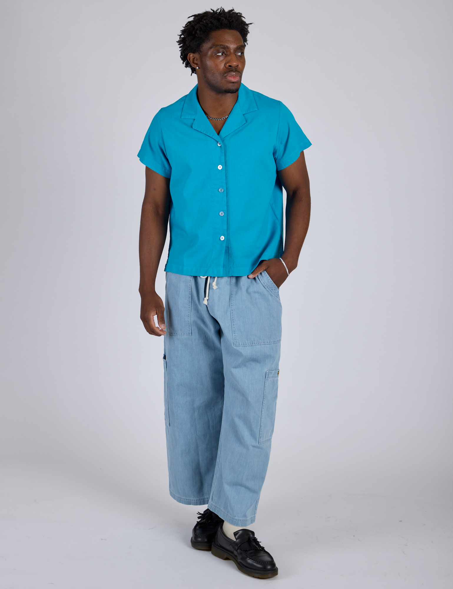 Pantry Button-Up in Hawaiian Blue and light wash Denim Drop Pocket Pants worn by Isaac
