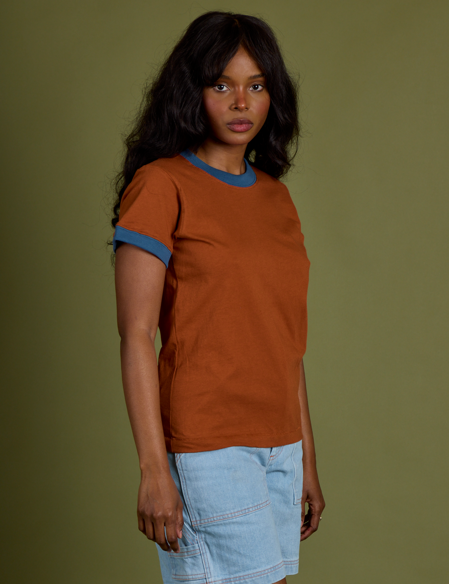 Angled front view of Vintage Ringer Tee in Burnt Terracotta on Kandia