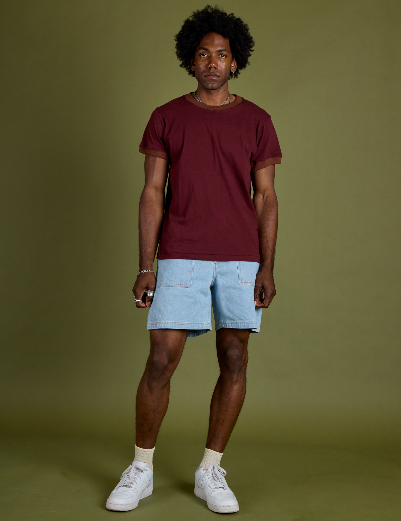 Jerrod is wearing Vintage Ringer Tee in Red Wine paired with light wash Carpenter Shorts