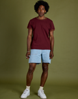 Jerrod is wearing Vintage Ringer Tee in Red Wine paired with light wash Carpenter Shorts