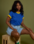 Vintage Ringer Tee in Royal Blue and Carpenter Shorts in Light Wash worn by Kandia