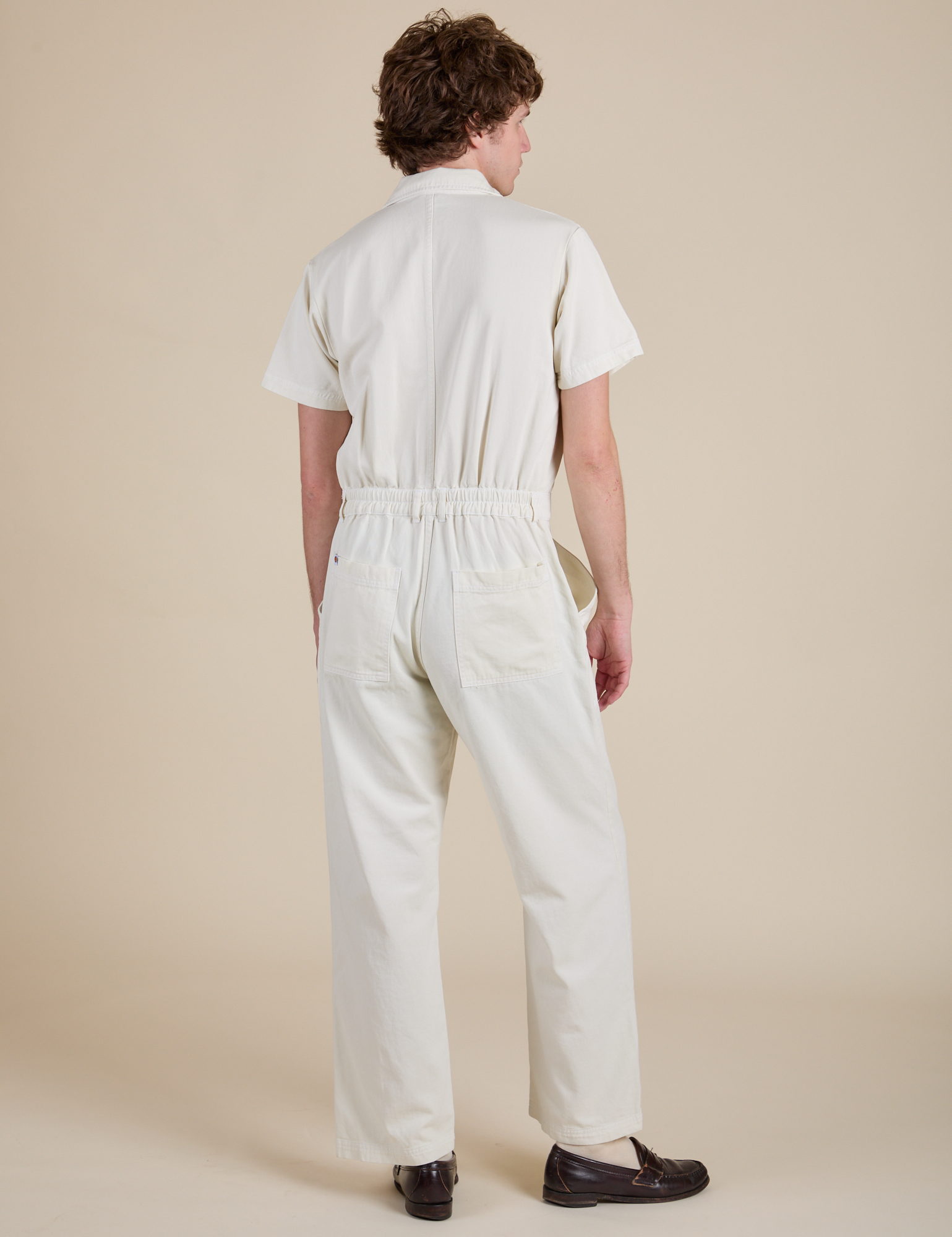 Short Sleeve Jumpsuit in Vintage Tee White back view on Quinn