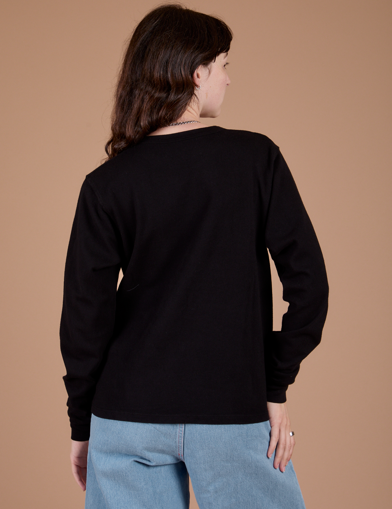 Long Sleeve Burly Tee in Basic Black back view on Alex