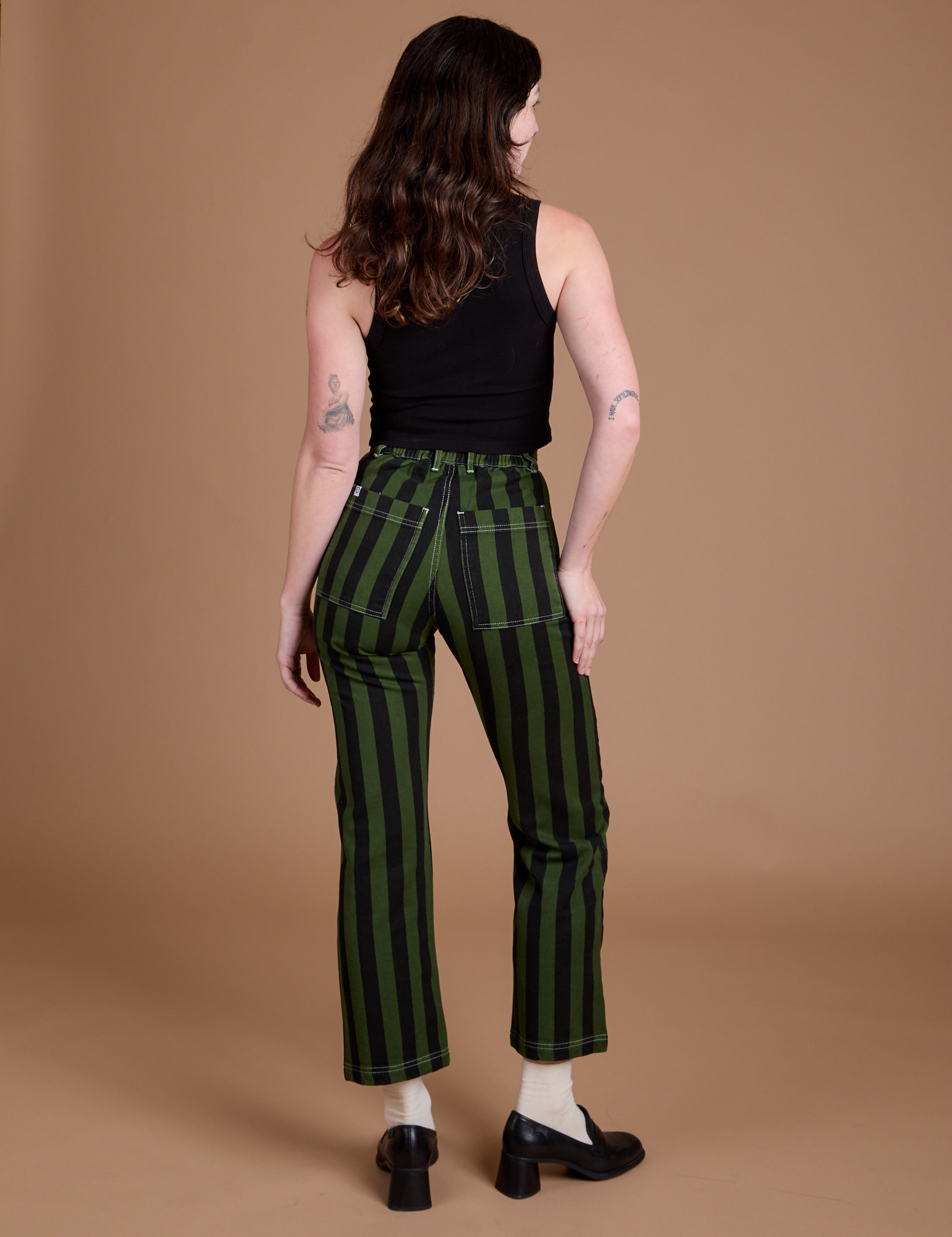 Back view of Black Stripe Work Pants in Evergreen on Alex