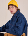 Quinn is wearing Ribbed Beanie in Golden Yellow