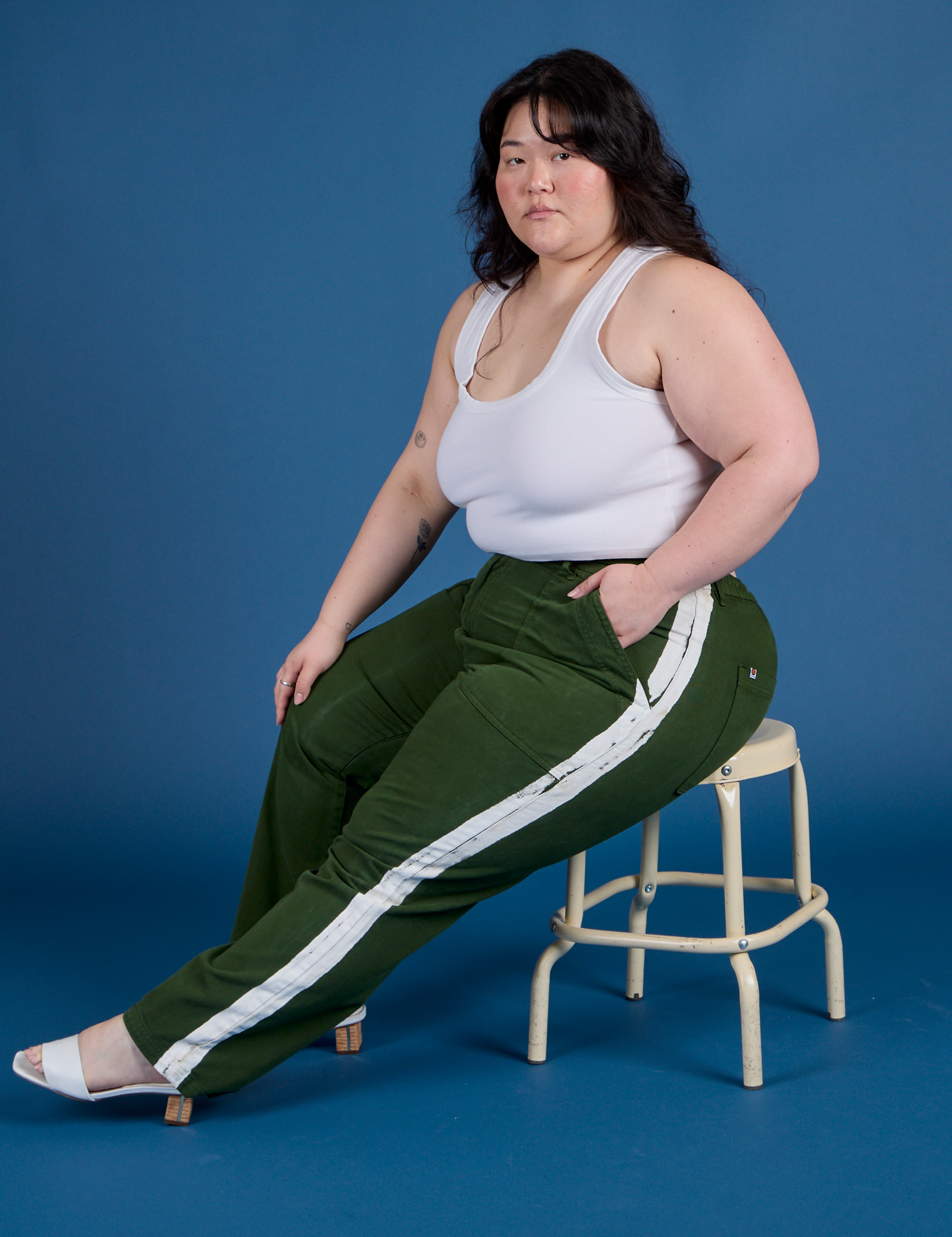Painted Work Pants in Evergreen and vintage tee white Cropped Tank worn by Ashley