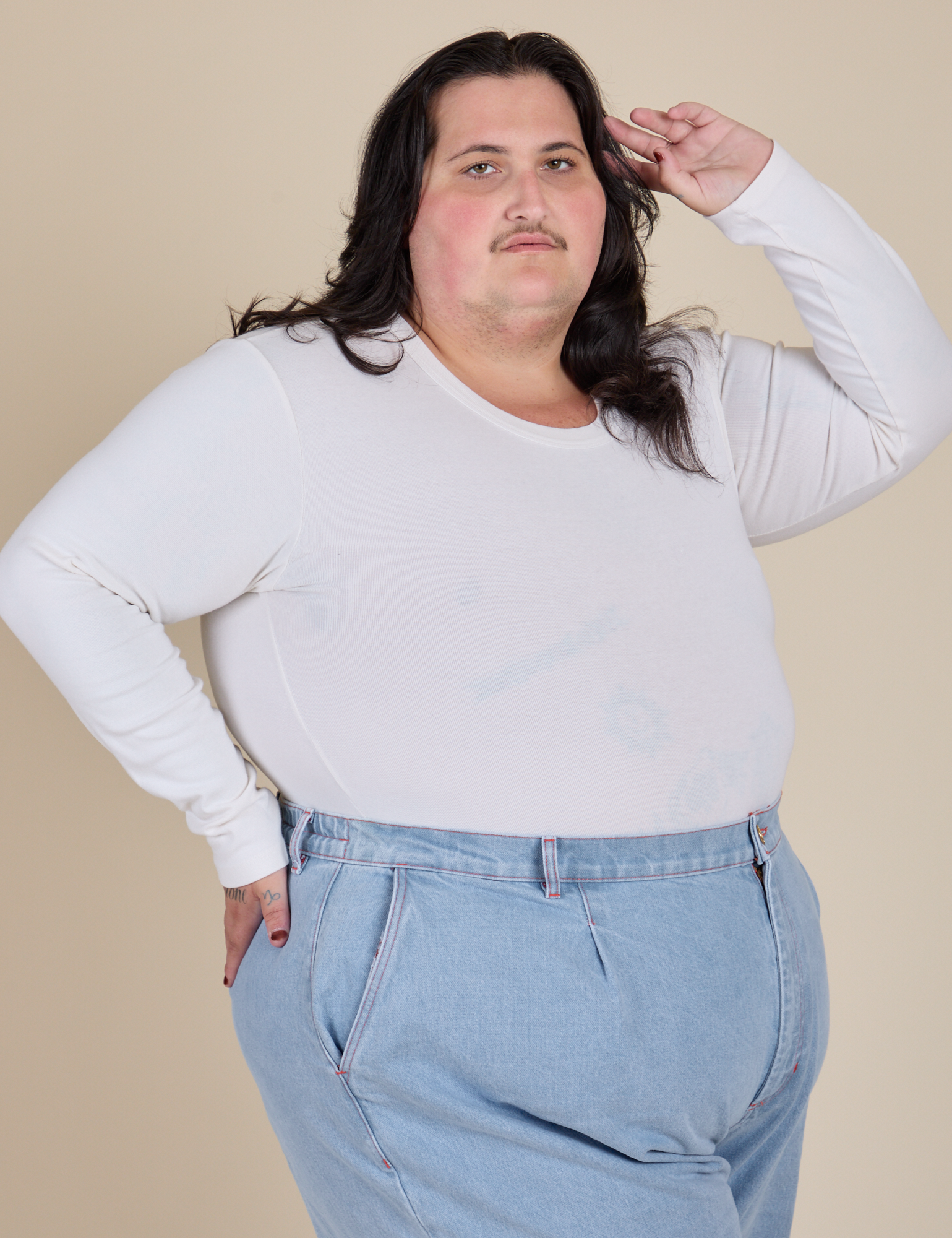 Long Sleeve Baby Tee in Vintage Tee Off-White angled front view on Sam