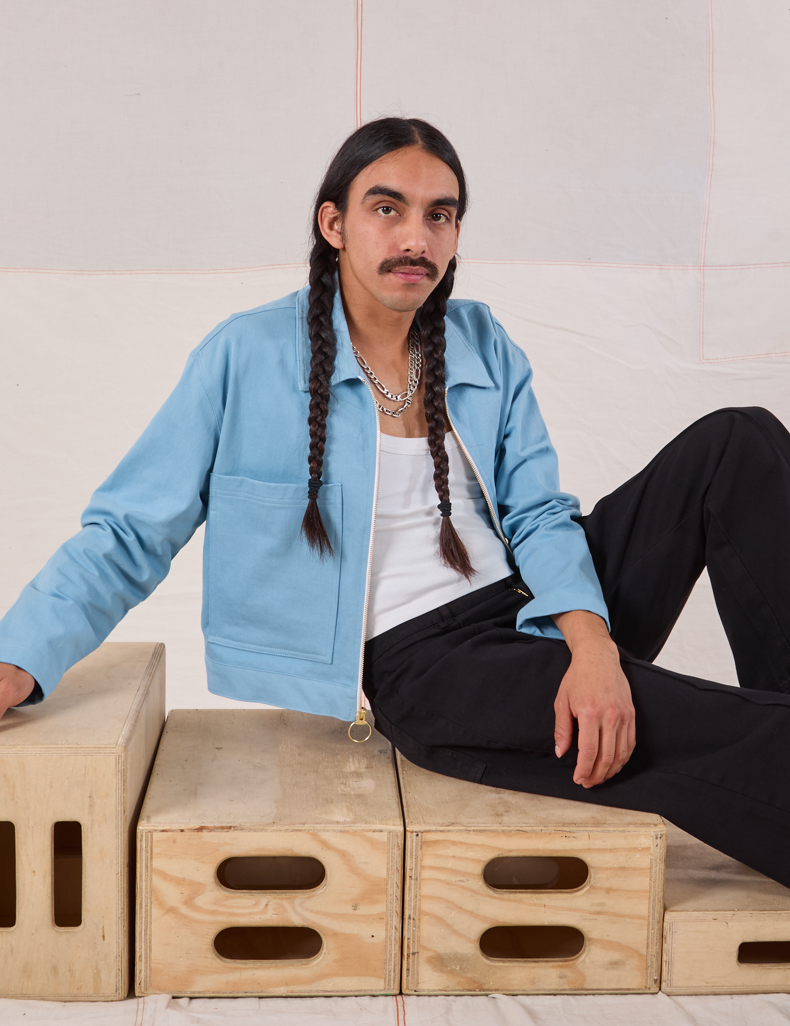 Anthony is wearing Mechanic Jacket in Baby Blue