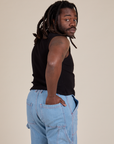 Angled back view of Muscle Tee in Basic Black on Demi