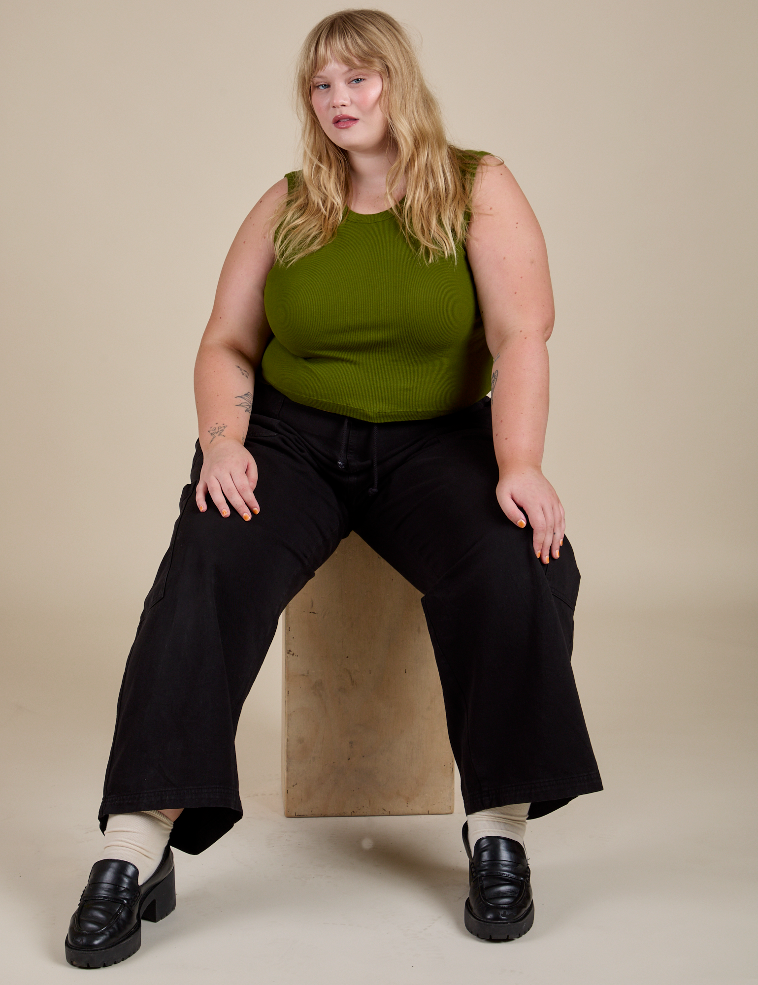 Muscle Tee in Summer Olive and black Drop Pocket Cargo Pants worn by Juliet