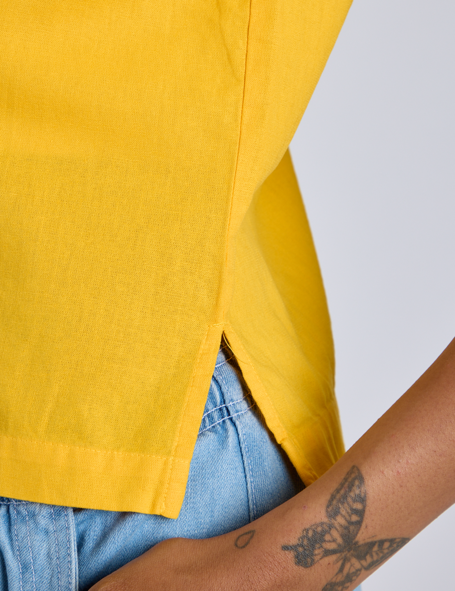 Close up of Pantry Button-Up in Sunshine Yellow on Kira