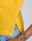 Close up of Pantry Button-Up in Sunshine Yellow on Kira