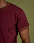 Close up of Vintage Ringer Tee in Red Wine sleeve on Jerrod