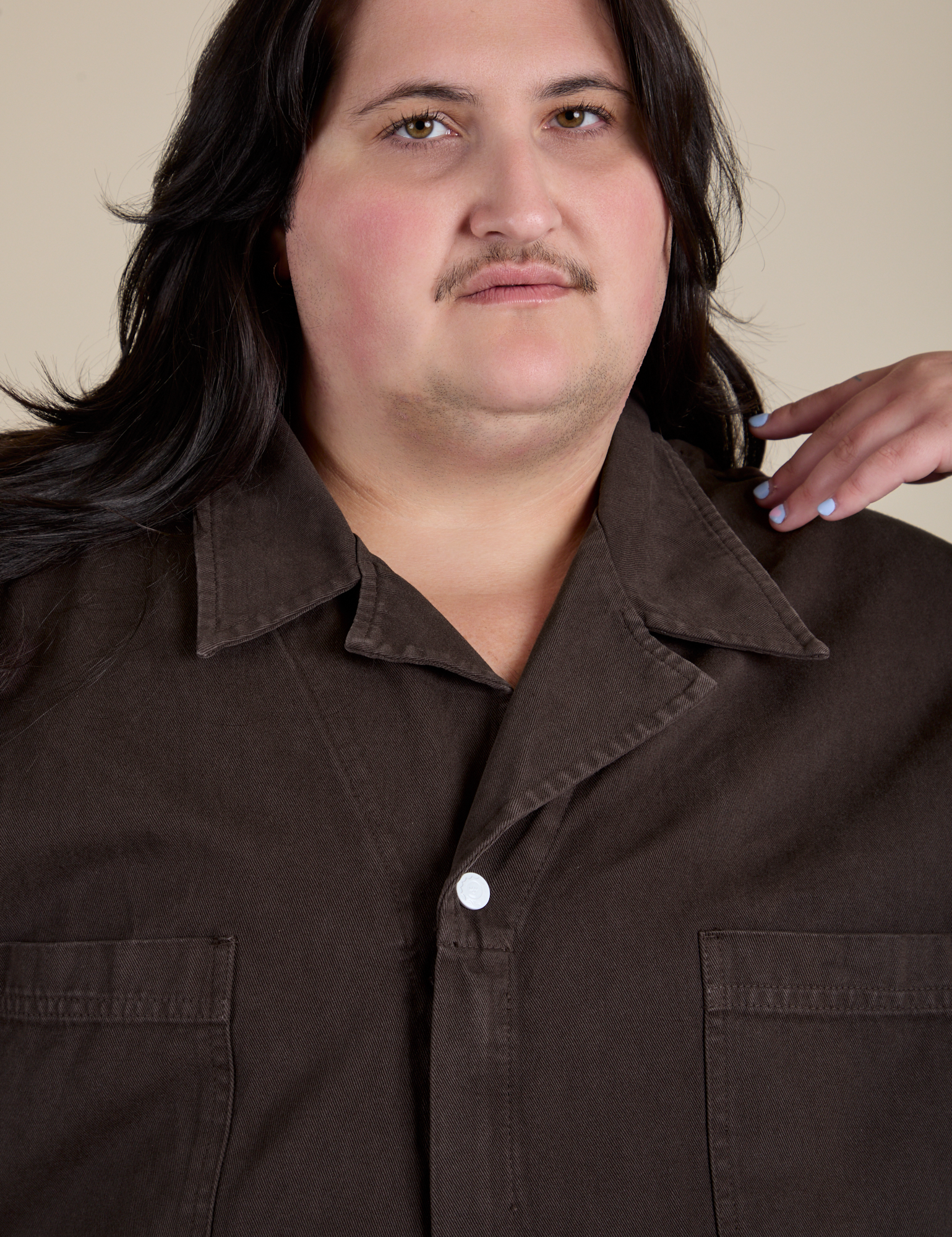 Front close up of Short Sleeve Jumpsuit in Espresso Brown on Sam