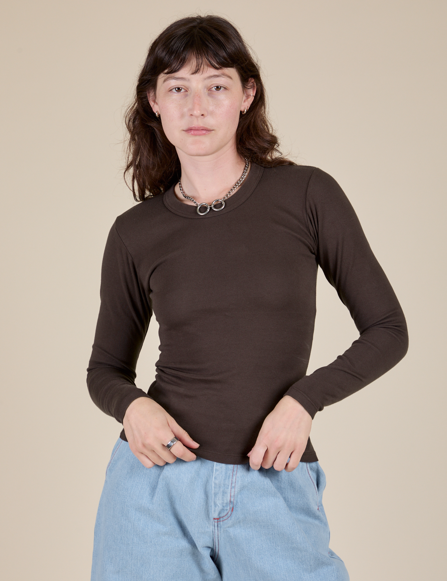 Alex is 5’8” and wearing P Long Sleeve Baby Tee in Espresso Brown