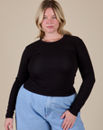 Lish is 5’8” and wearing XS Long Sleeve Baby Tee in Basic Black