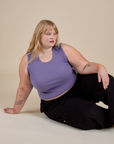 Juliet is wearing Muscle Tee in Faded Grape