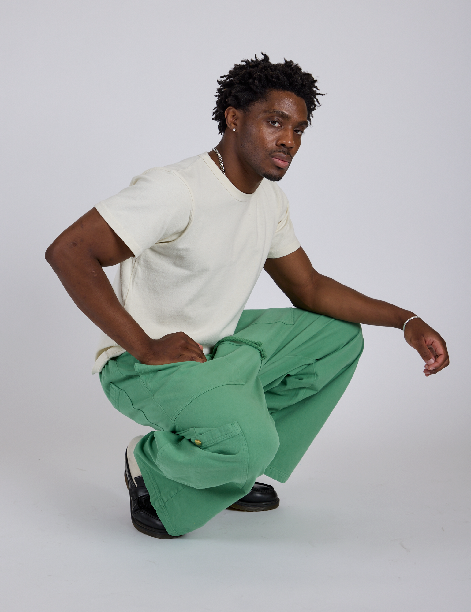 Drop Pocket Cargo Pants in Seafoam Green and Organic Vintage Tee in Vintage Tee White worn by Isaac