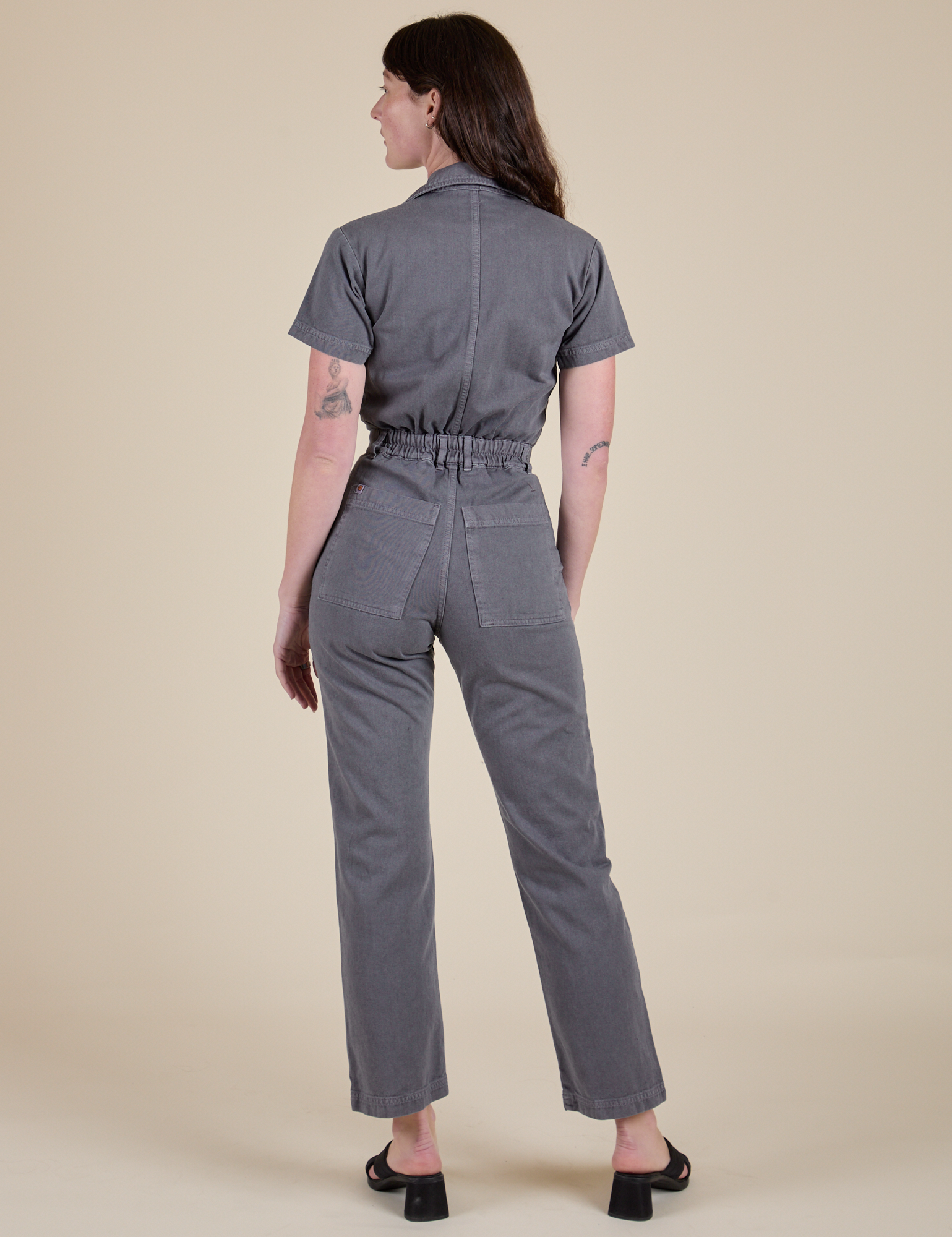 Short Sleeve Jumpsuit in Washed Grey back view on Alex