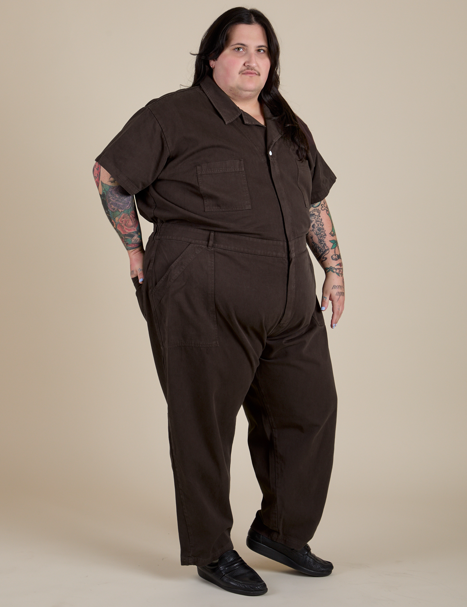 Angled front view of Short Sleeve Jumpsuit in Espresso Brown on Sam
