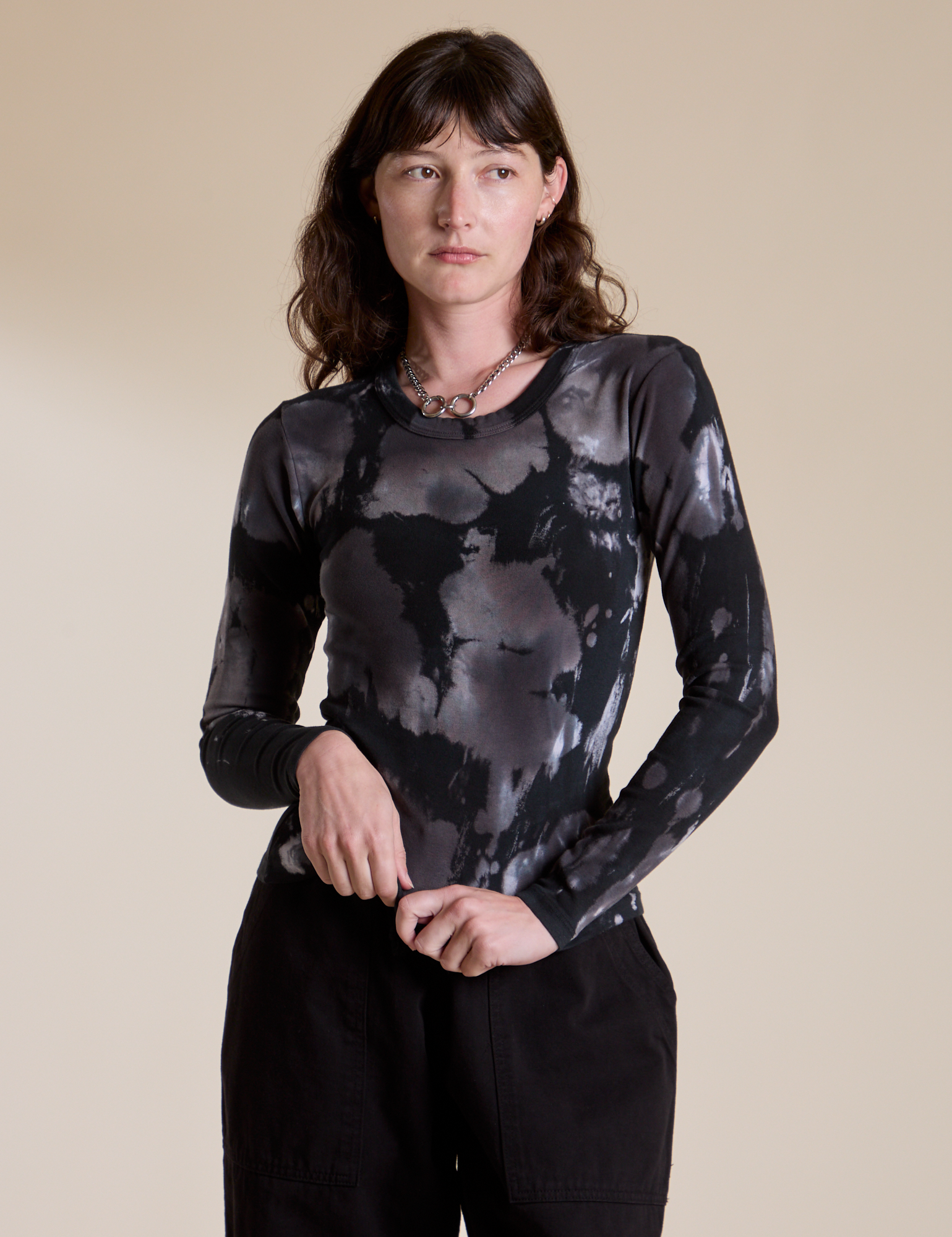 Alex is 5’8” and wearing P Long Sleeve Baby Tee in Ink Blot