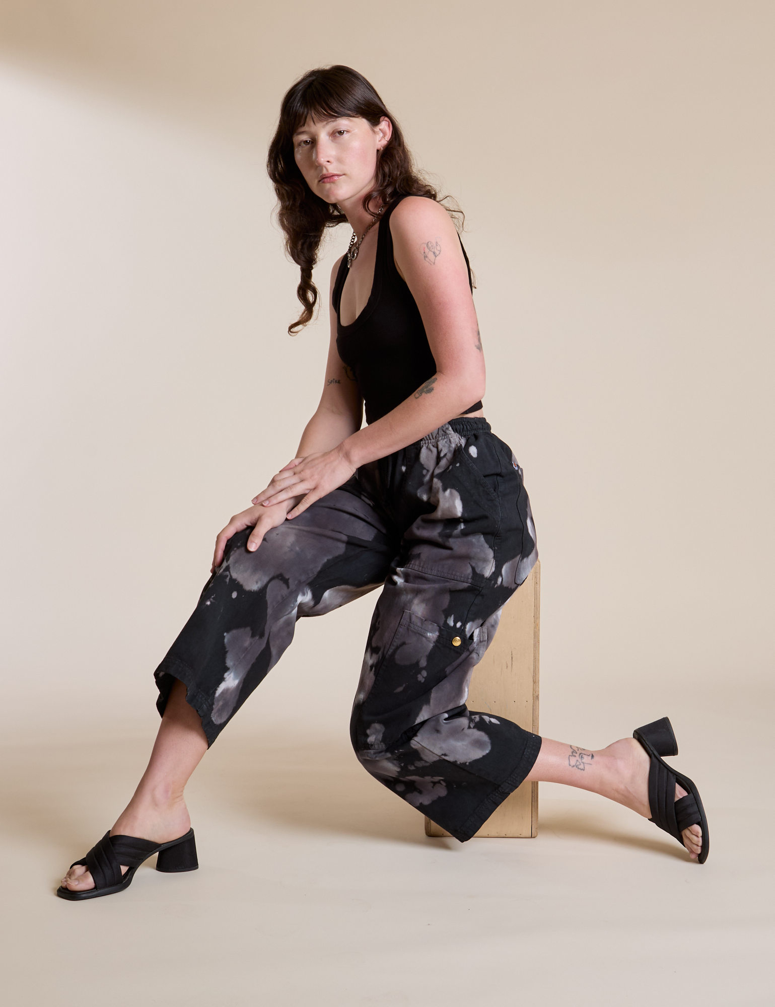 Magic Waters Drop Pocket Pants in Ink Blot and black Cropped Tank on Alex