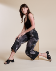 Magic Waters Drop Pocket Pants in Ink Blot and black Cropped Tank on Alex