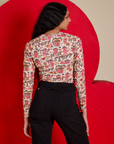 Back view of Long Sleeve Baby Tee in Hot Stuff Print on Shahana