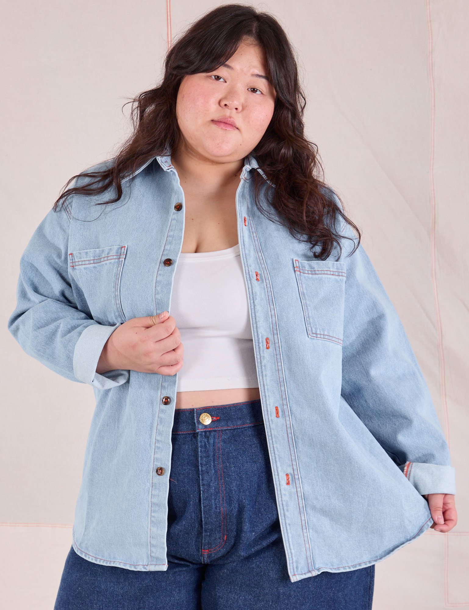 Ashley is 5'7" and wearing L Denim Overshirt in Light Wash