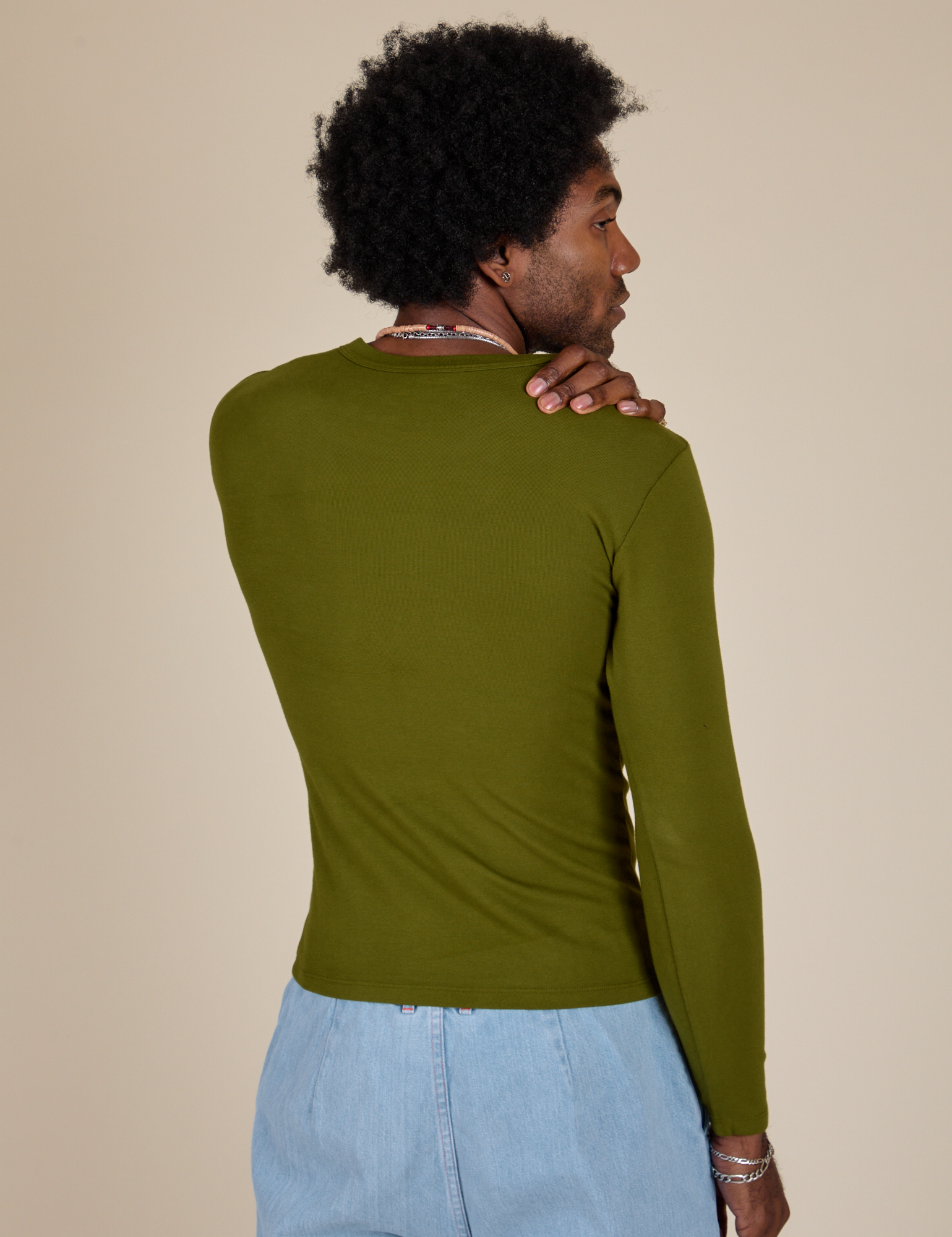 Long Sleeve Baby Tee in Summer Olive back view on Jerrod