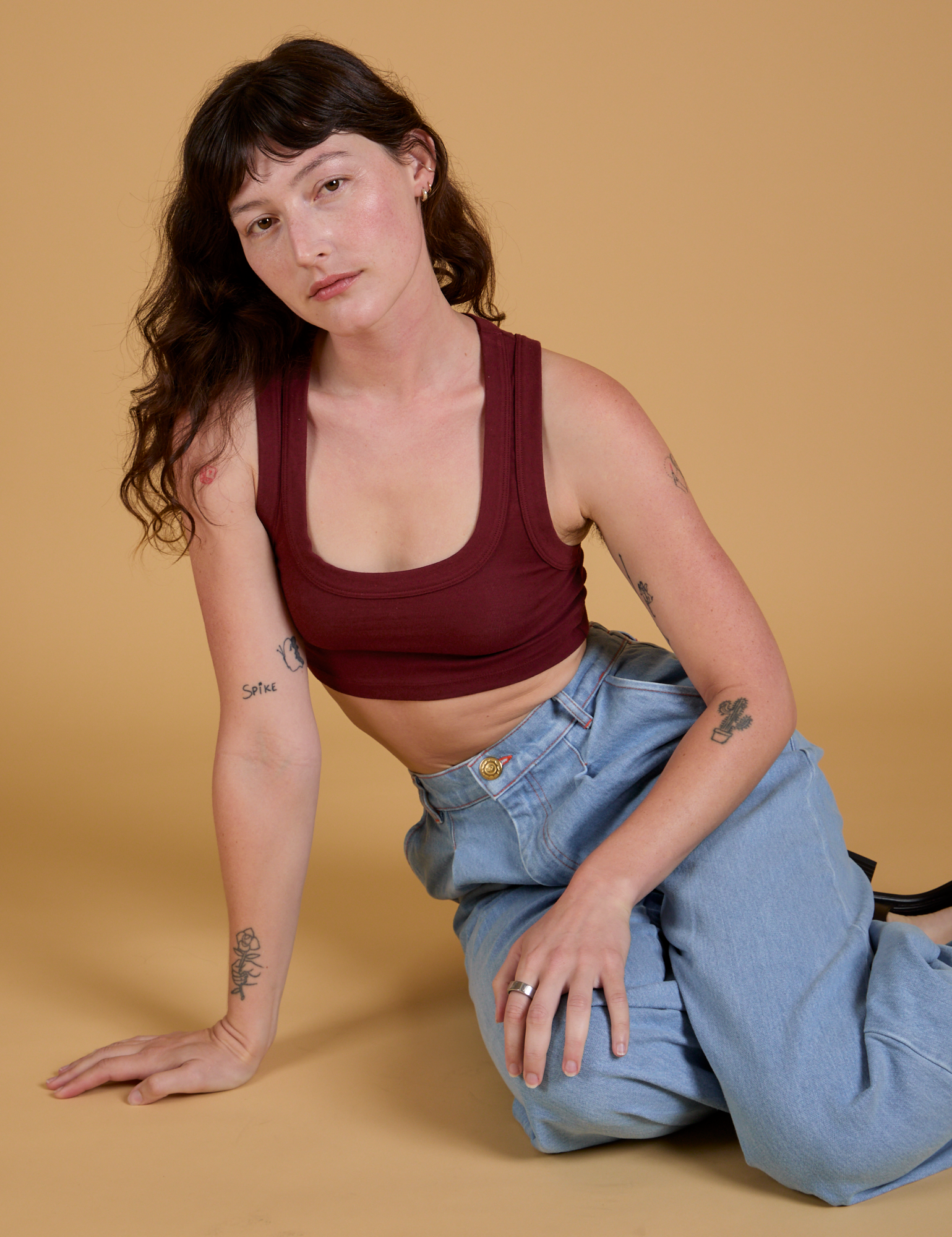 Alex is wearing Mini Tank in Red Wine