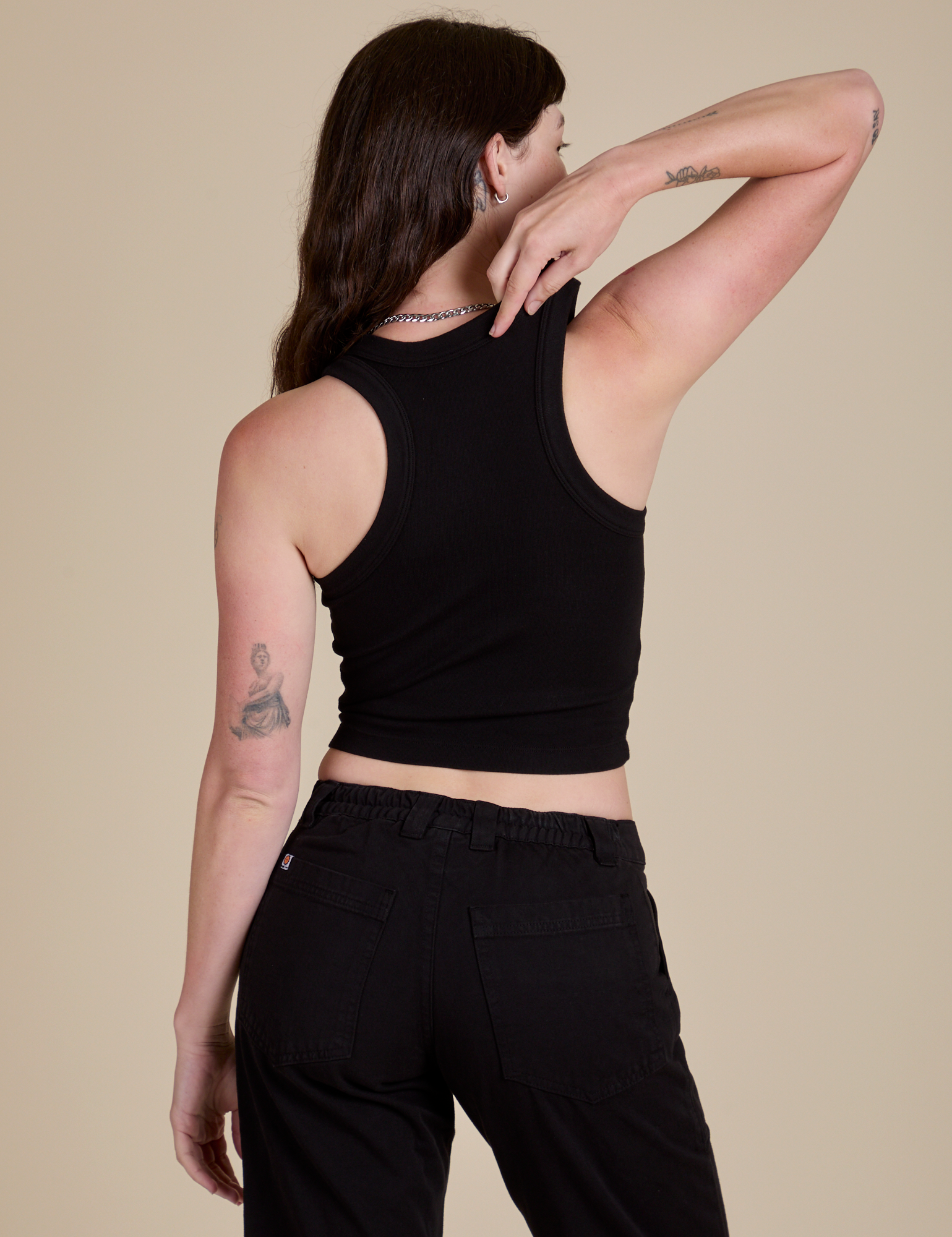 Racerback Tank in Black back view on Alex