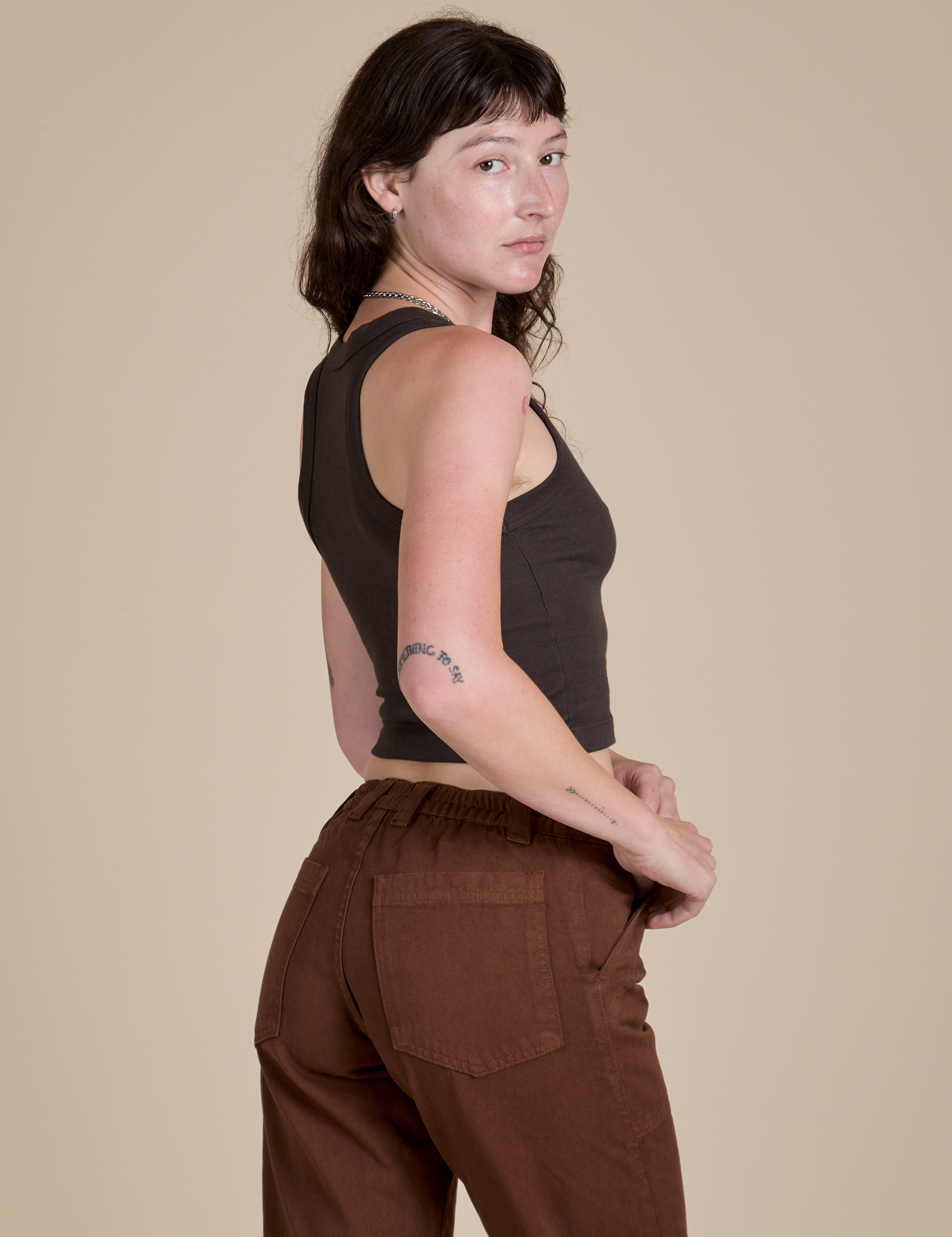 Racerback Tank in Espresso Brown angled back view on Alex