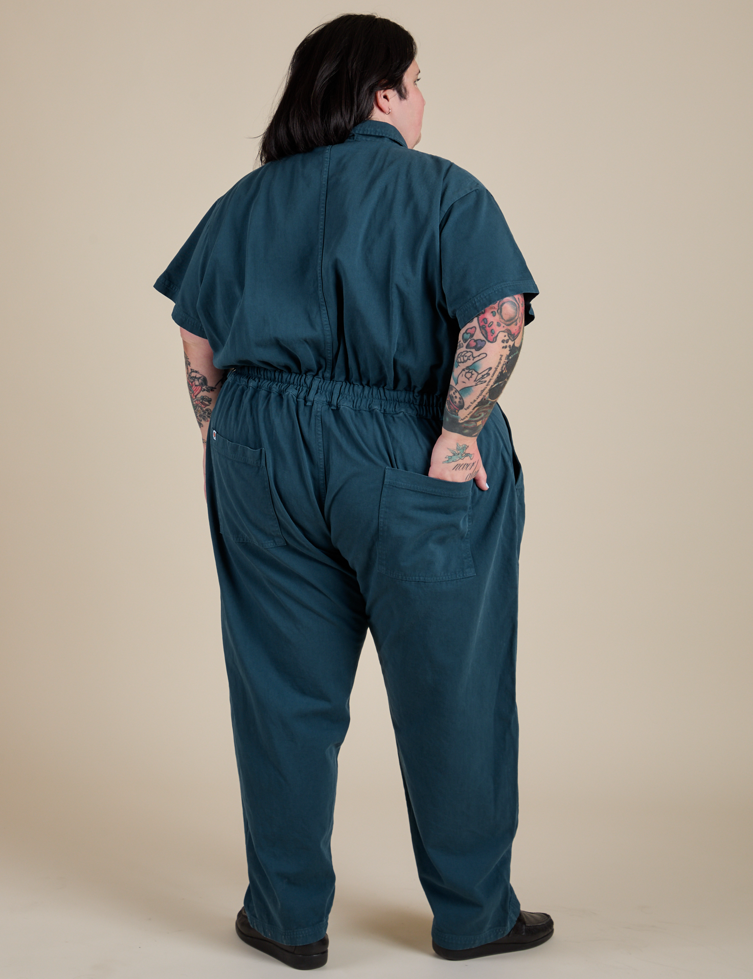 Short Sleeve Jumpsuit in Lagoon back view on Sam
