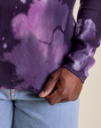 Long Sleeve Baby Tee in Dark Lavender bottom close up with Demi holding the hem