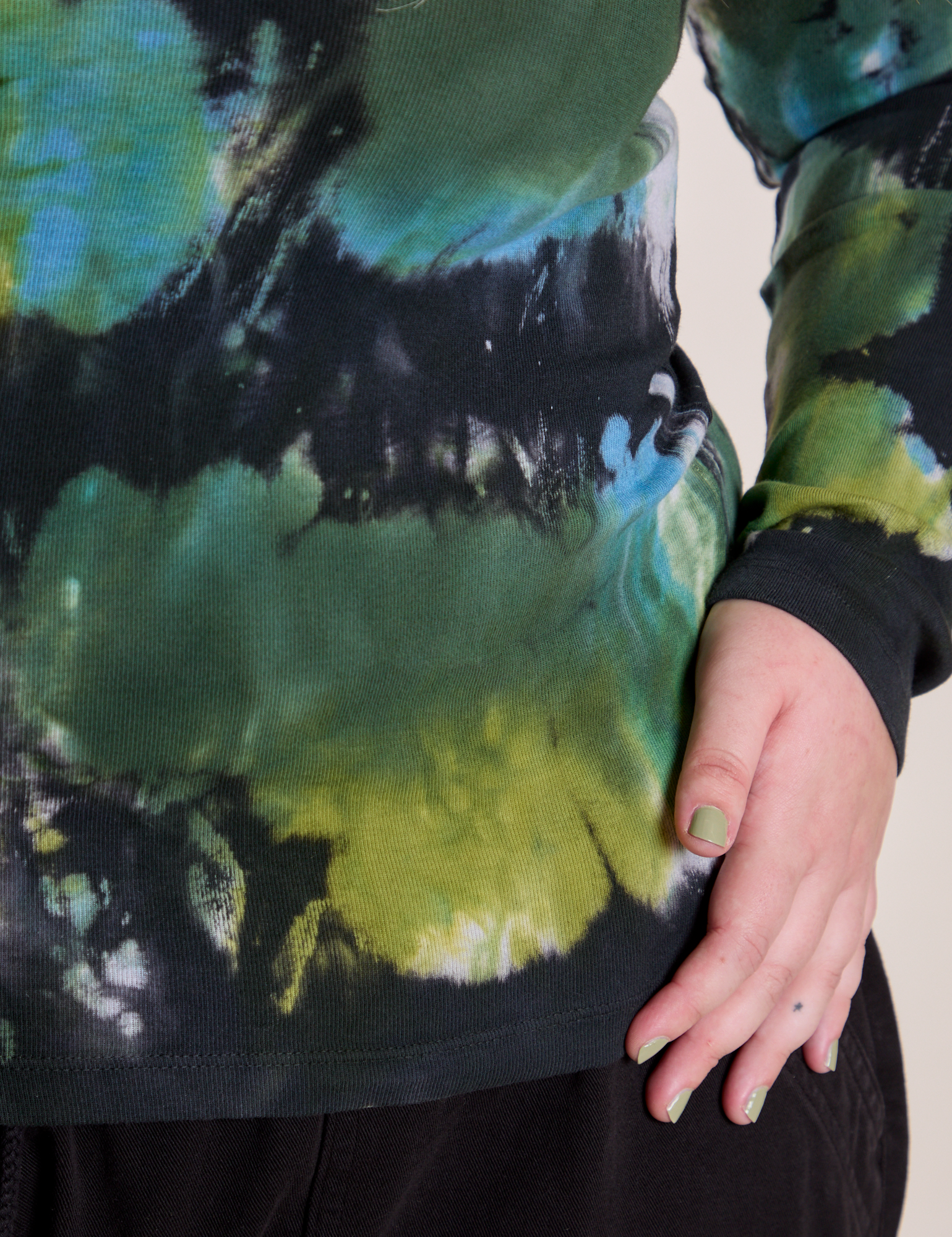 Long Sleeve Baby Tee in Green Pool bottom close up on Juliet