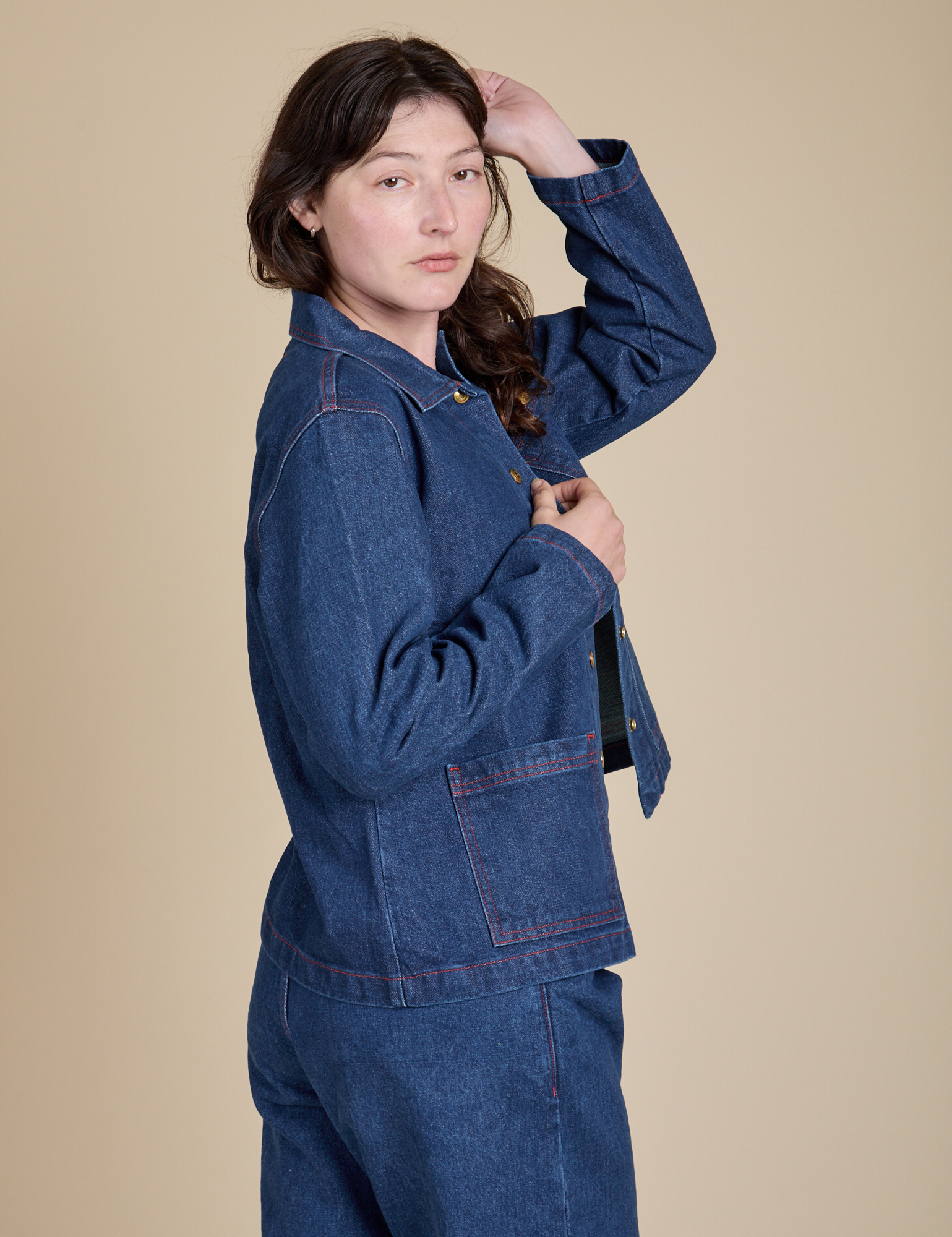 Side view of Indigo Denim Work Jacket in Dark Wash on Alex