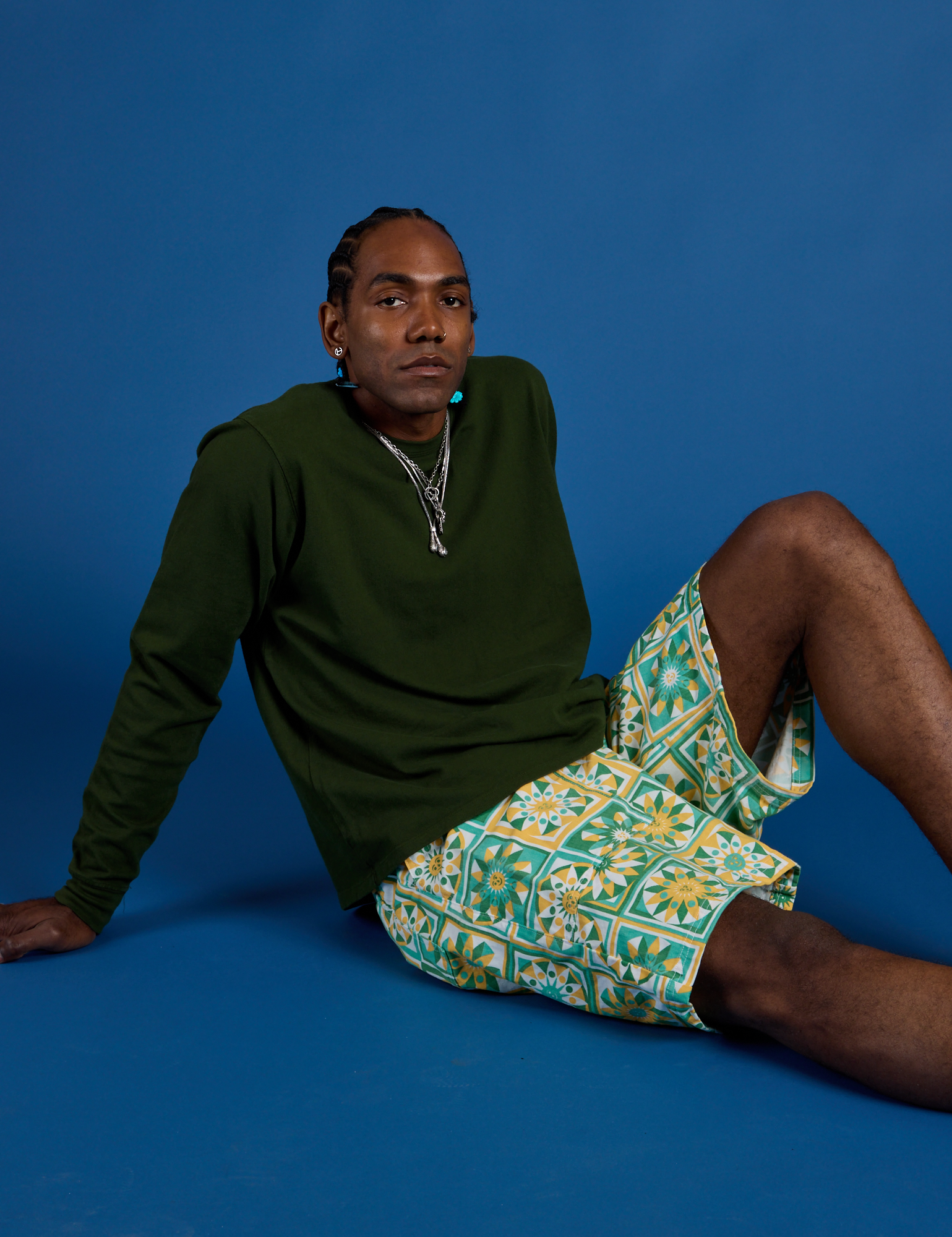 Longline Work Shorts in Spring Quilt Print and Long Sleeve Burly Tee in Evergreen worn by Jerrod