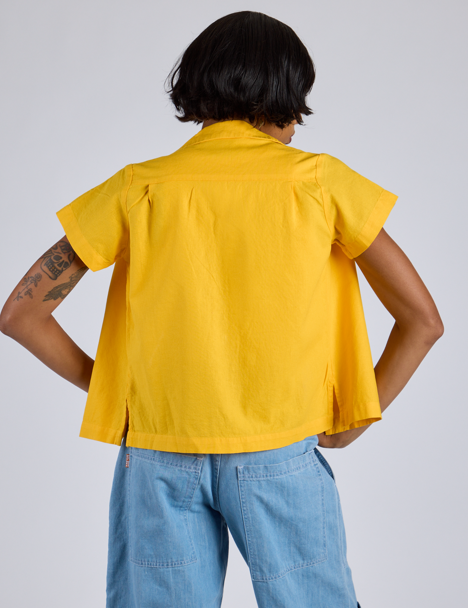 Pantry Button-Up in Sunshine Yellow back view on Kira