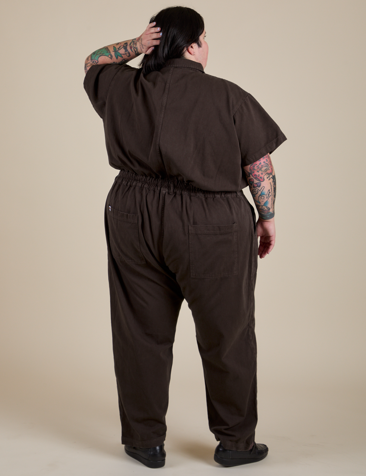 Back view of Short Sleeve Jumpsuit in Espresso Brown on Sam