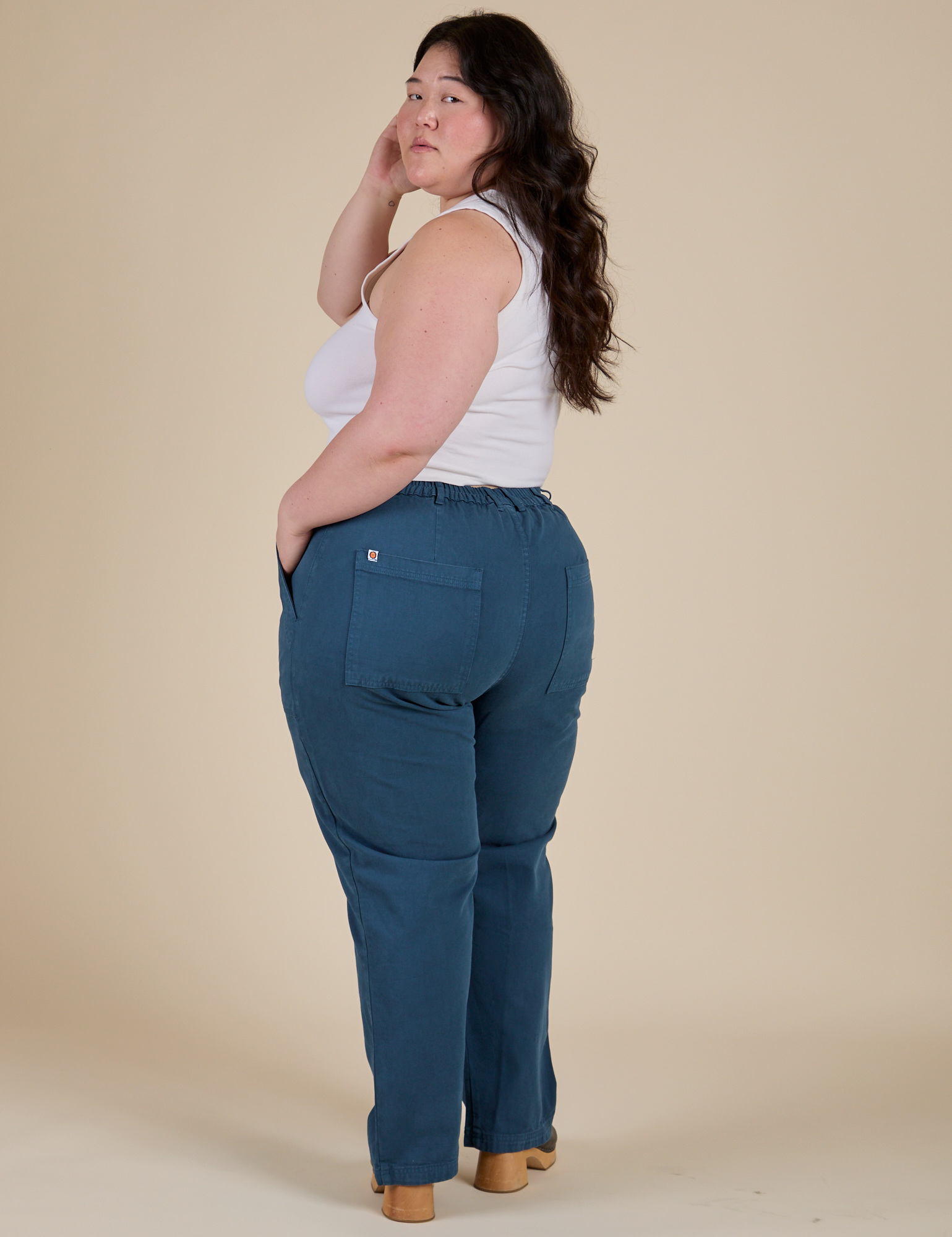 Angled back view of Work Pants in Lagoon on Ashley