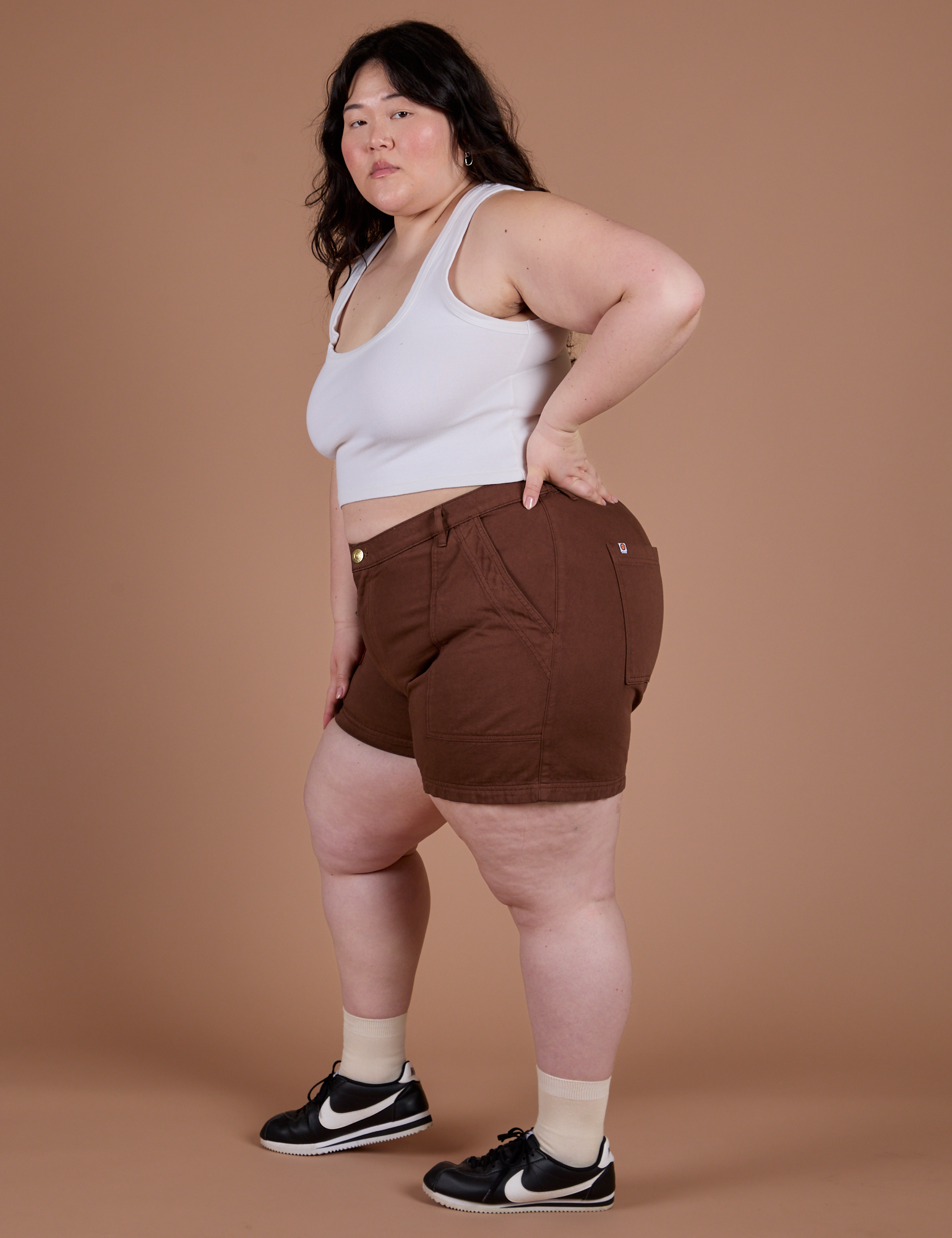 Side view of Classic Work Shorts in Fudgesicle Brown and Cropped Tank in Vintage Tee White on Ashley