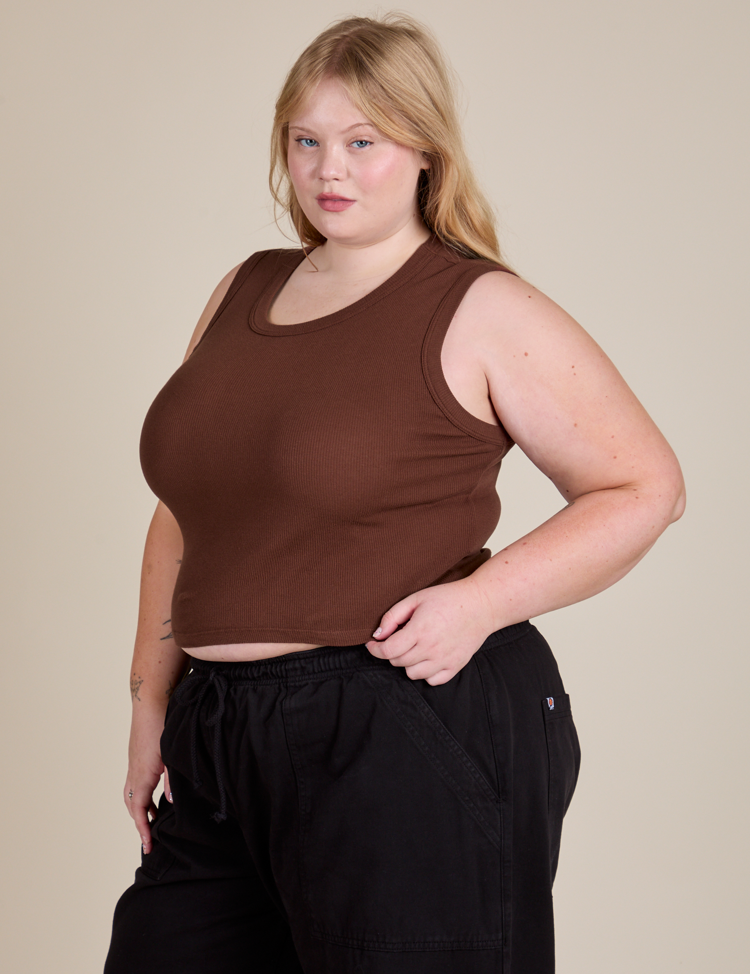 Angled front view of Muscle Tee in Fudgesicle Brown on Juliet